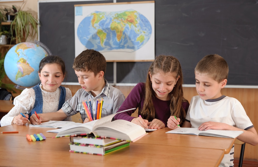 image of students working on task cards