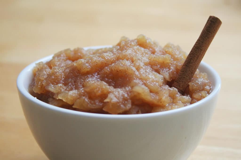 Image of homemade applesauce in a white bowl.