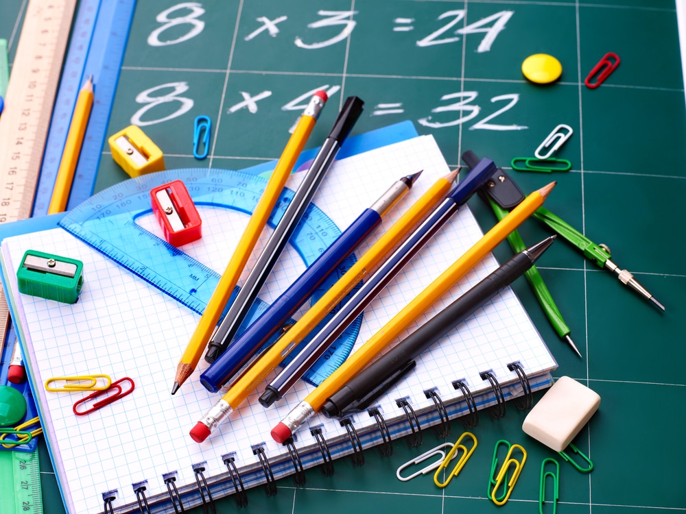 Image of notebooks and school supplies for math task cards