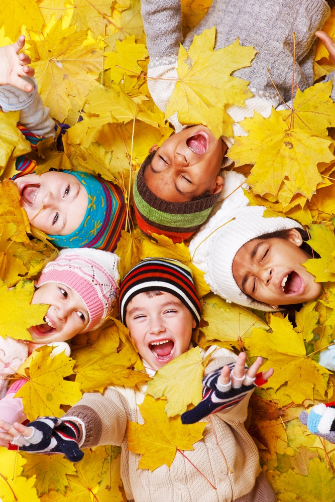Image of excited kids getting ready for Fall literacy ideas.